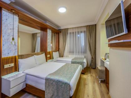 Kupeli Hotel - image 11
