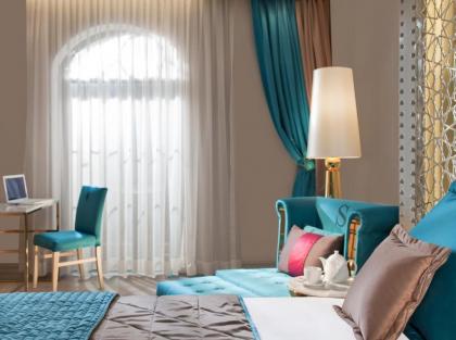 Sura Design Hotel & Suites - image 12