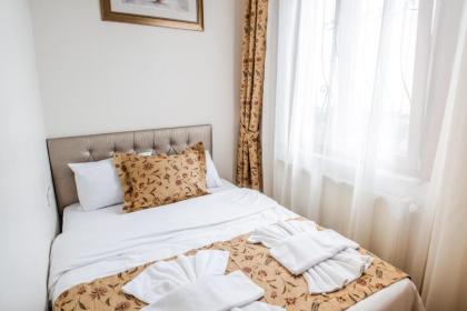 Camelot Apartment - image 16