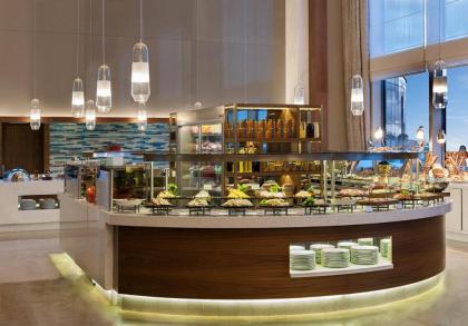 Elite World Asia Hotel - image 12