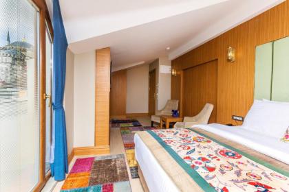 Obelisk Hotel&Suites - image 11