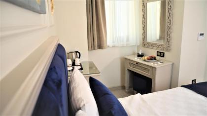 OMMA HOTEL - image 4
