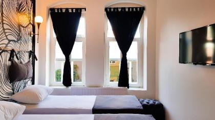 Casa Rosa Suites - image 2