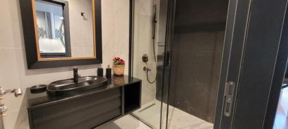 Sleek City Apartment With Premium Amenities - image 16